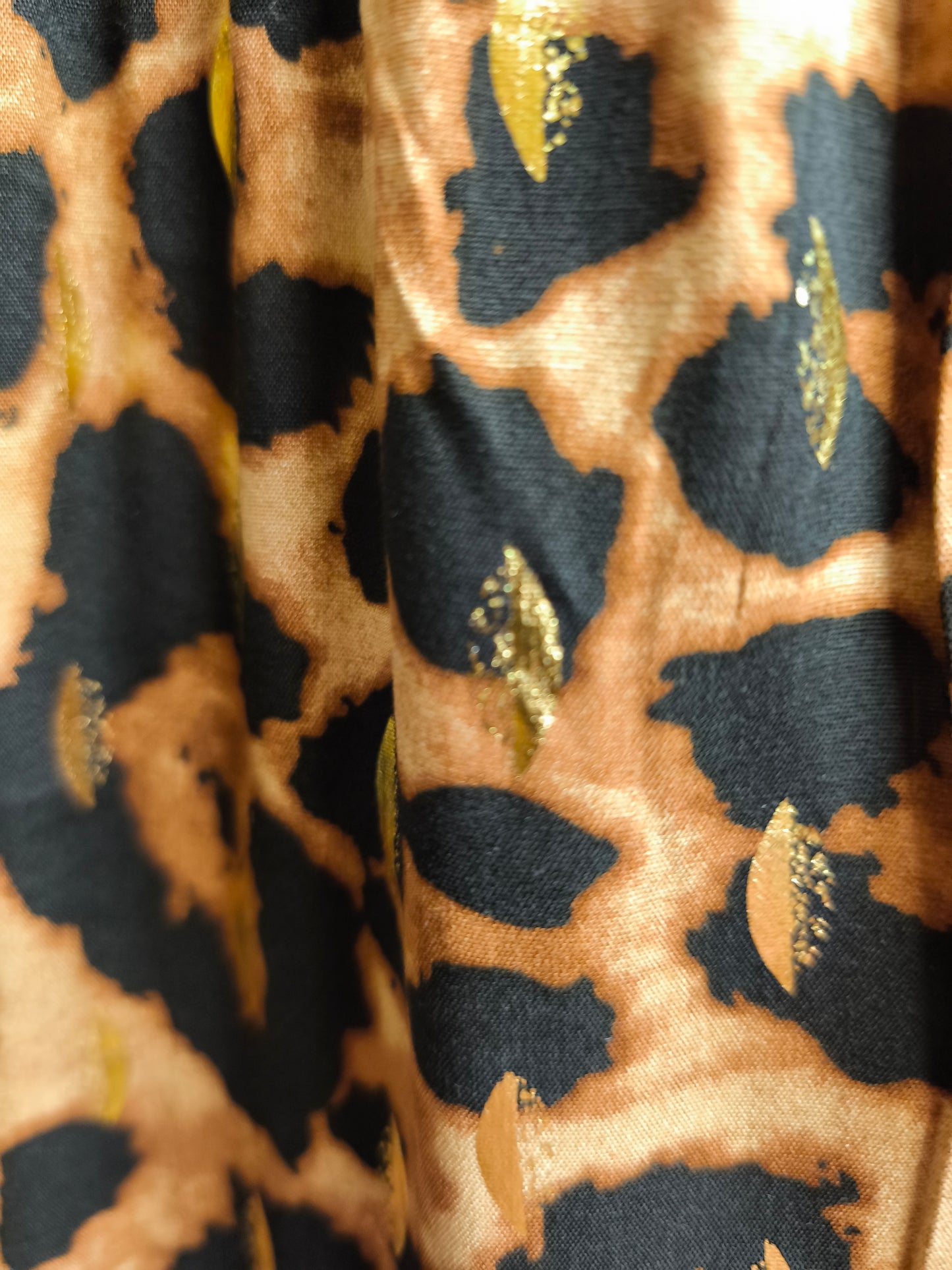 Robe léopard dos nue