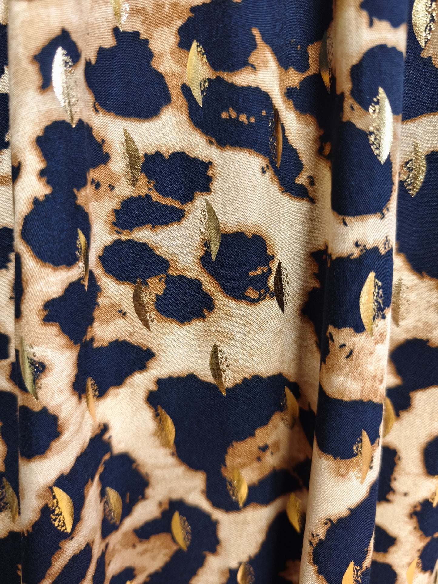 Robe léopard dos nue
